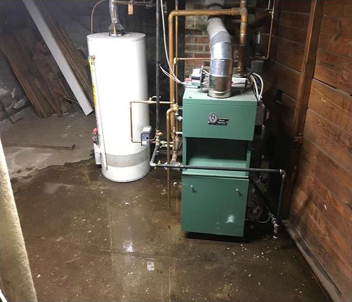 basement flooded due to a water heater burst